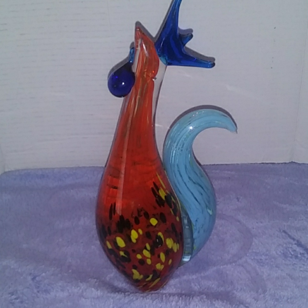 A solid glass rooster